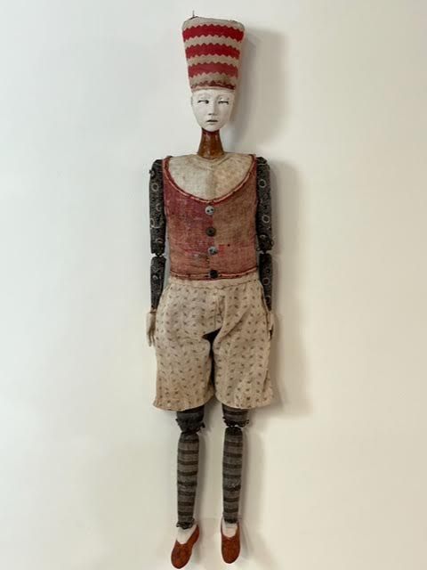 HENRI' Cathy Rose Mixed media wall mount; articulated figure, clay, altered wood, antique fabrics, leather, found objects 16 x 35 x 3 in. HENRI' Cathy Rose Mixed media wall mount; articulated figure, clay, altered wood, antique fabrics, leather, found objects 16 x 35 x 3 in.